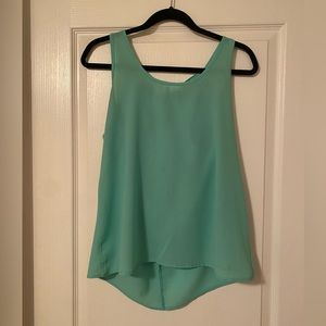 Brenda’s teal tank with back bow detail